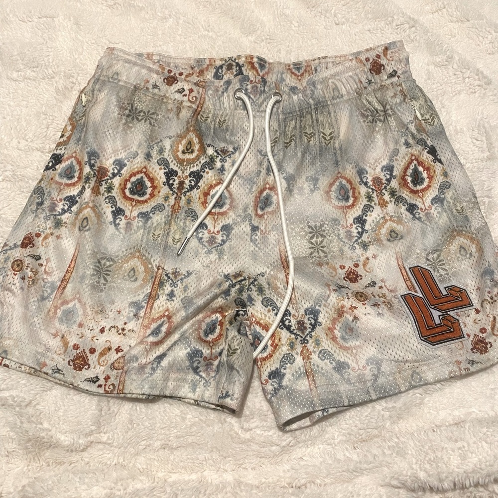 Lumber Legs men’s mesh gym shorts. Mid thigh, 4in inseam, 100% polyester, NEW